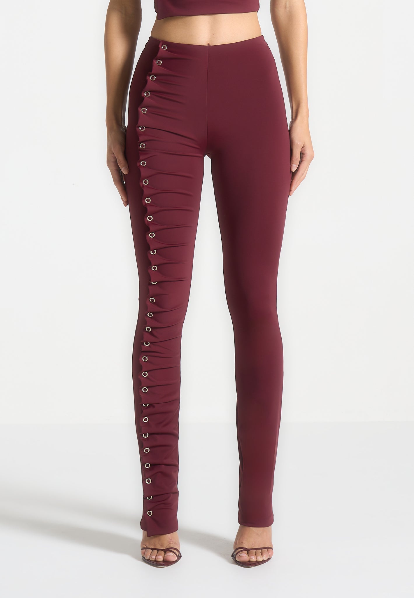 eyelet-detail-tacked-leggings-wine-red