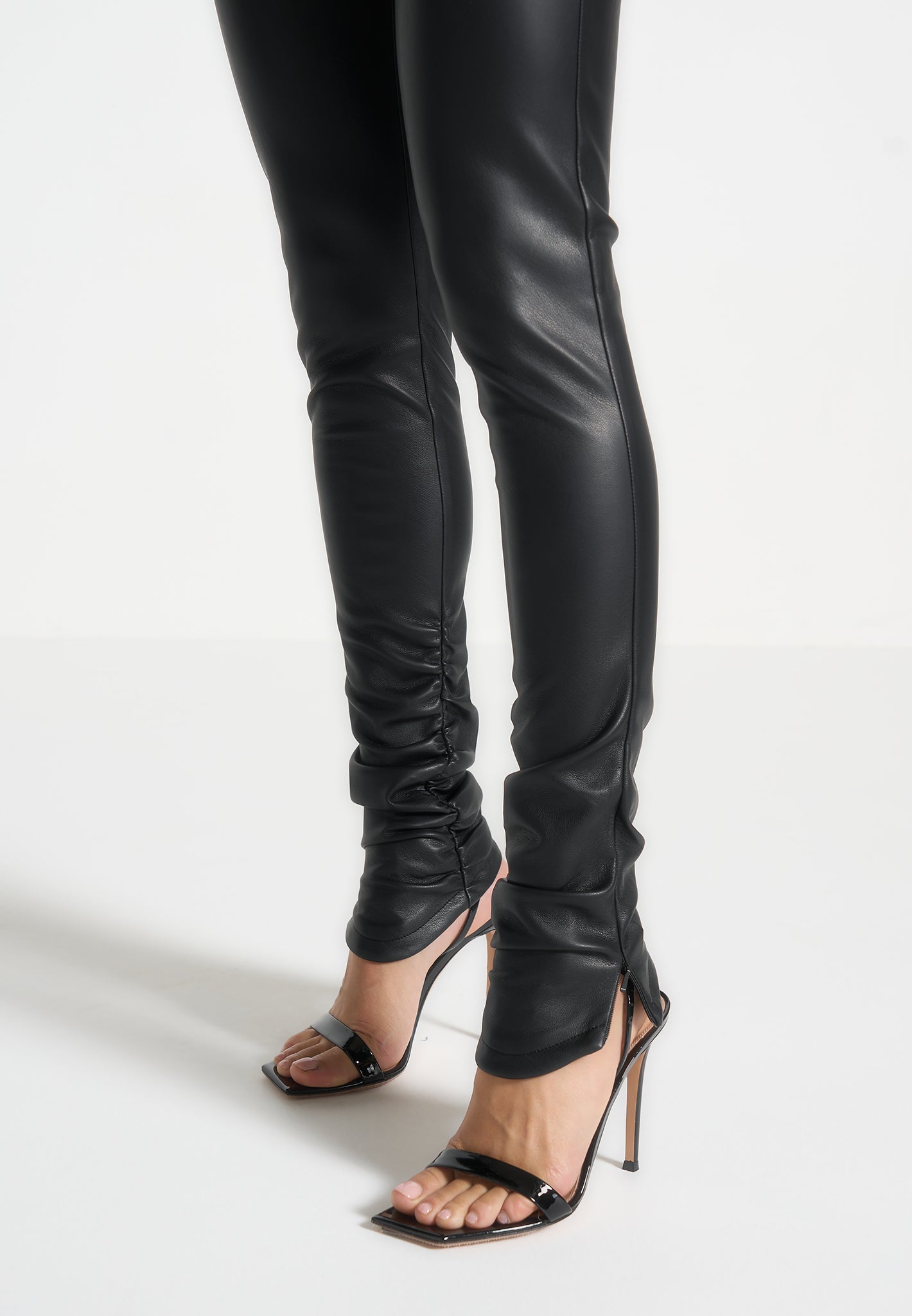 leather-angled-waistband-leggings-black