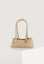 Annelise - Pebbled Leather Baguette Bag - Beige