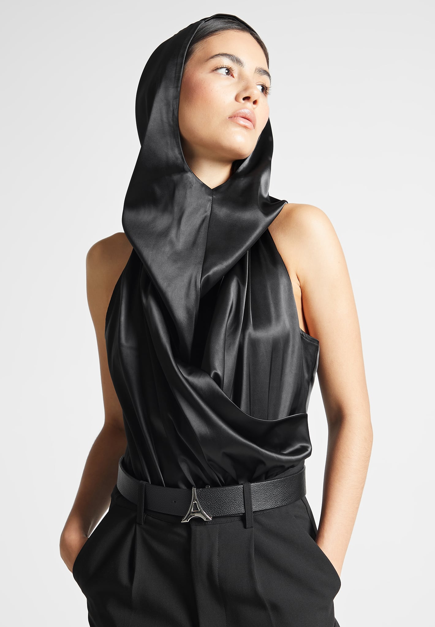 https://ca.manieredevoir.com/cdn/shop/files/Hooded-Cowl-Neck-Satin-Wrap-Bodysuit-Black5.jpg?v=1700222187