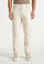 dn001-tapered-fit-jeans-cream