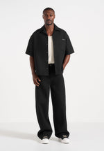 brook-unisex-signature-twill-boxy-shirt-black