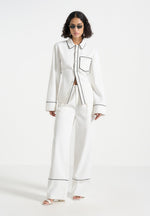 contrast-piped-pleated-trousers-white-black