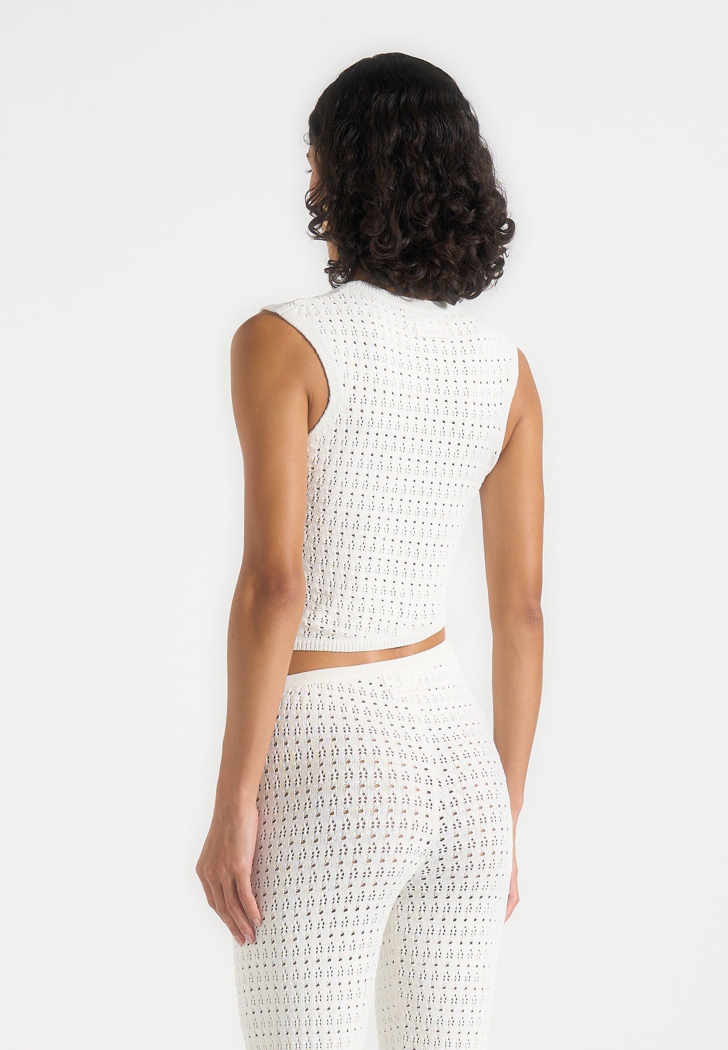 eugenie-pointelle-asymmetric-top-cream
