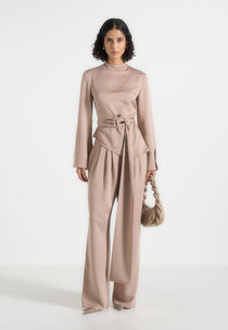 Aurore - Mock Neck Ring Belt Pleated Leg Jumpsuit - Beige