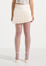 joelle-asymmetric-pleated-mini-skirt-cream