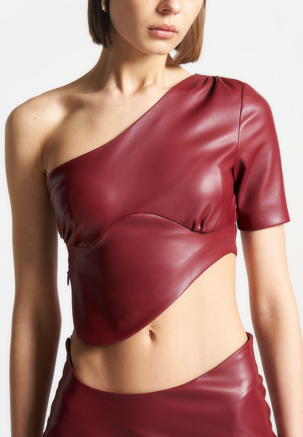 curved-hem-vegan-leather-crop-top-wine-red