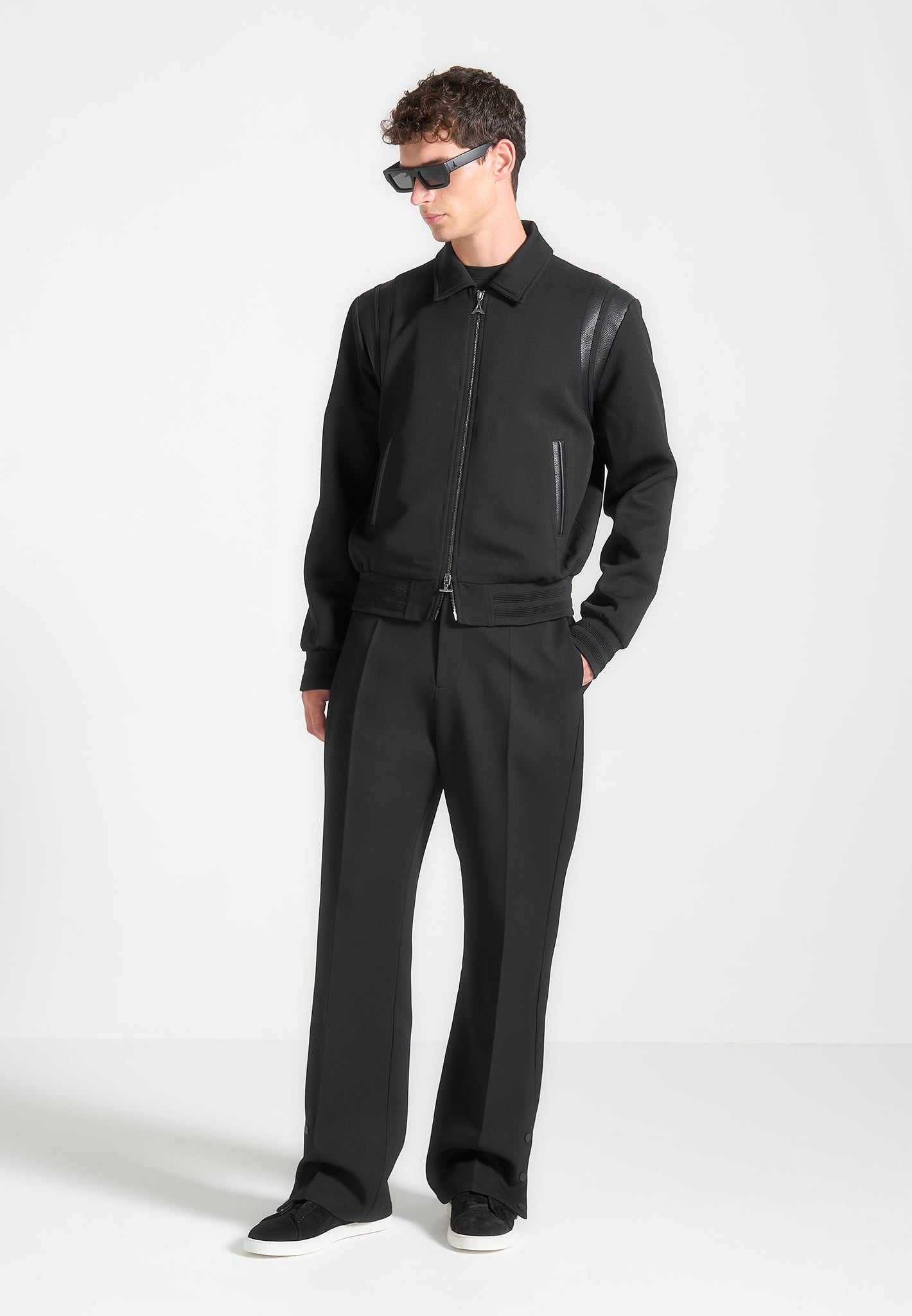 relaxed-fit-tailored-button-cuff-trousers-black