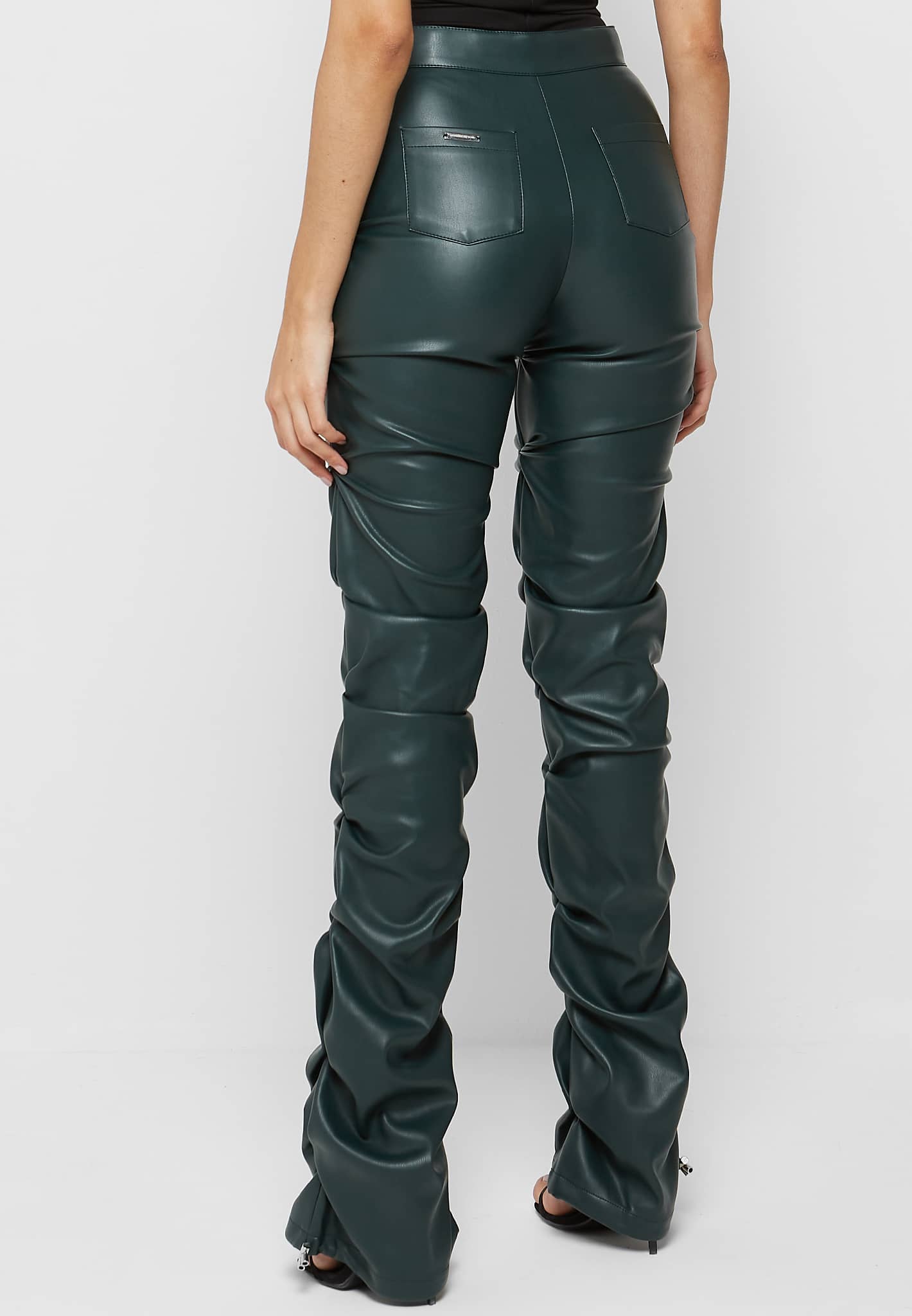 tacked-vegan-leather-flared-trousers-forest-green