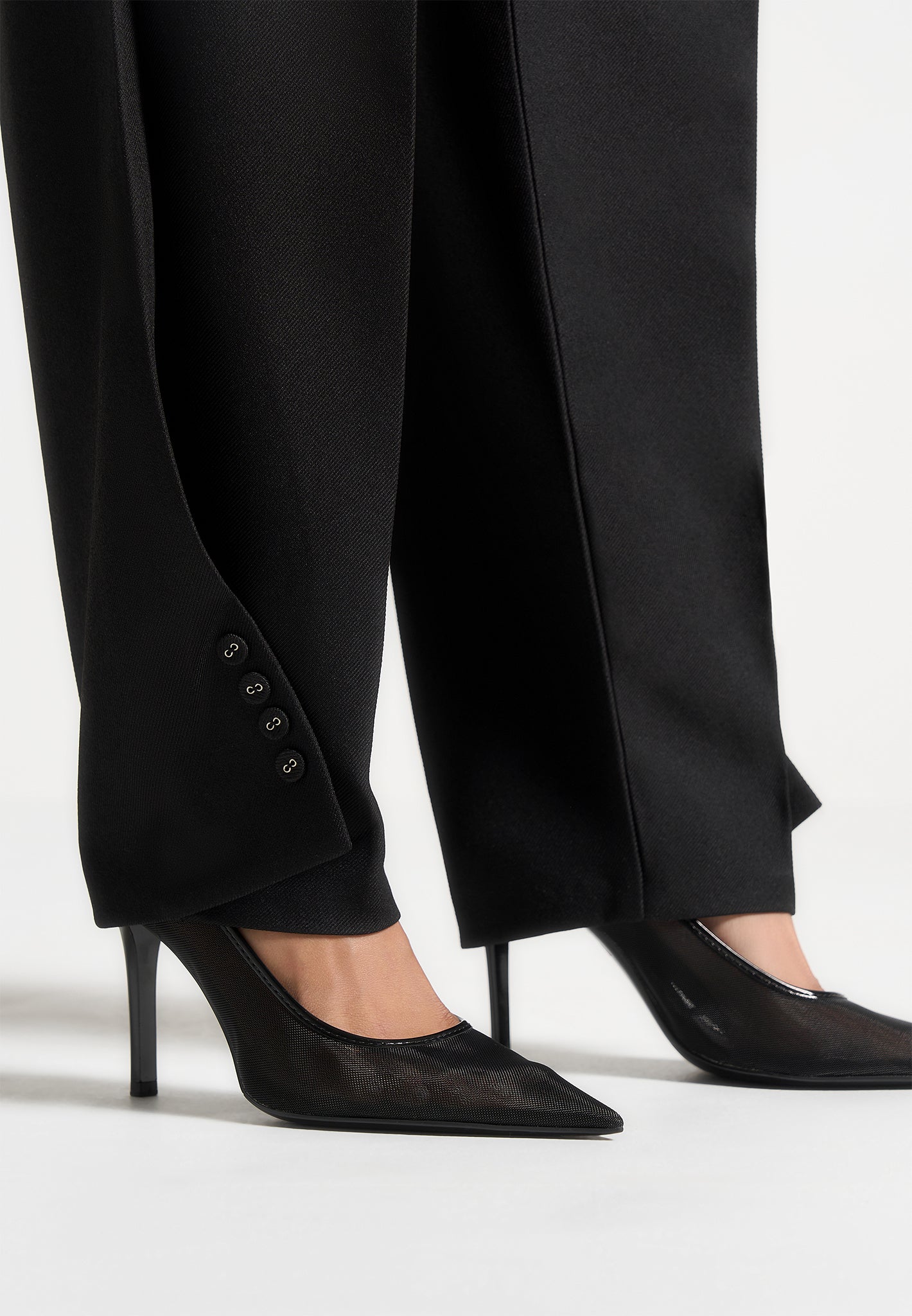 twist-leg-tailored-trousers-black