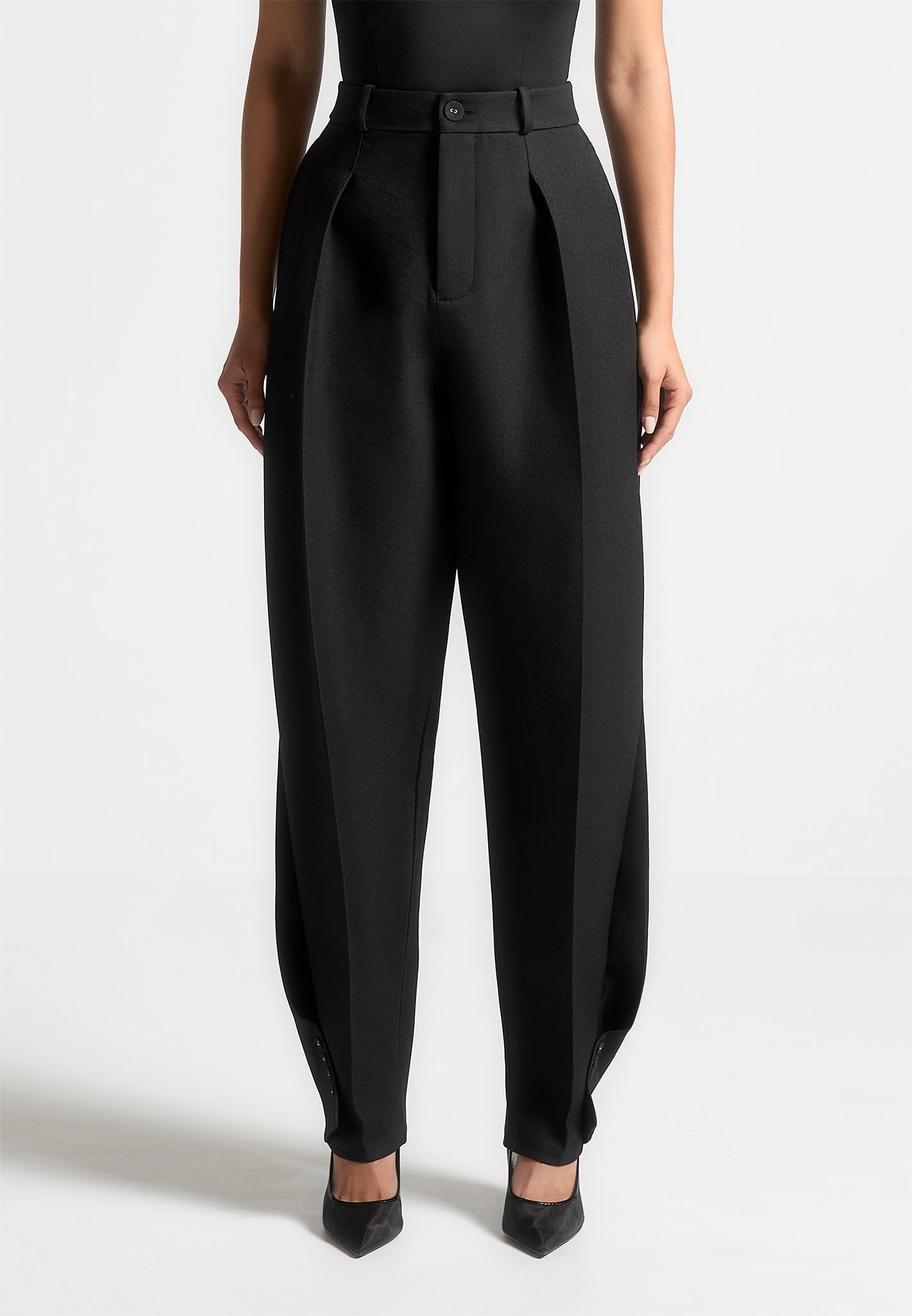 twist-leg-tailored-trousers-black